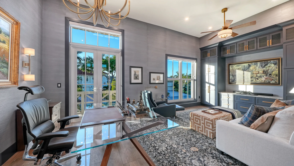 Study lounge with French doors and water views